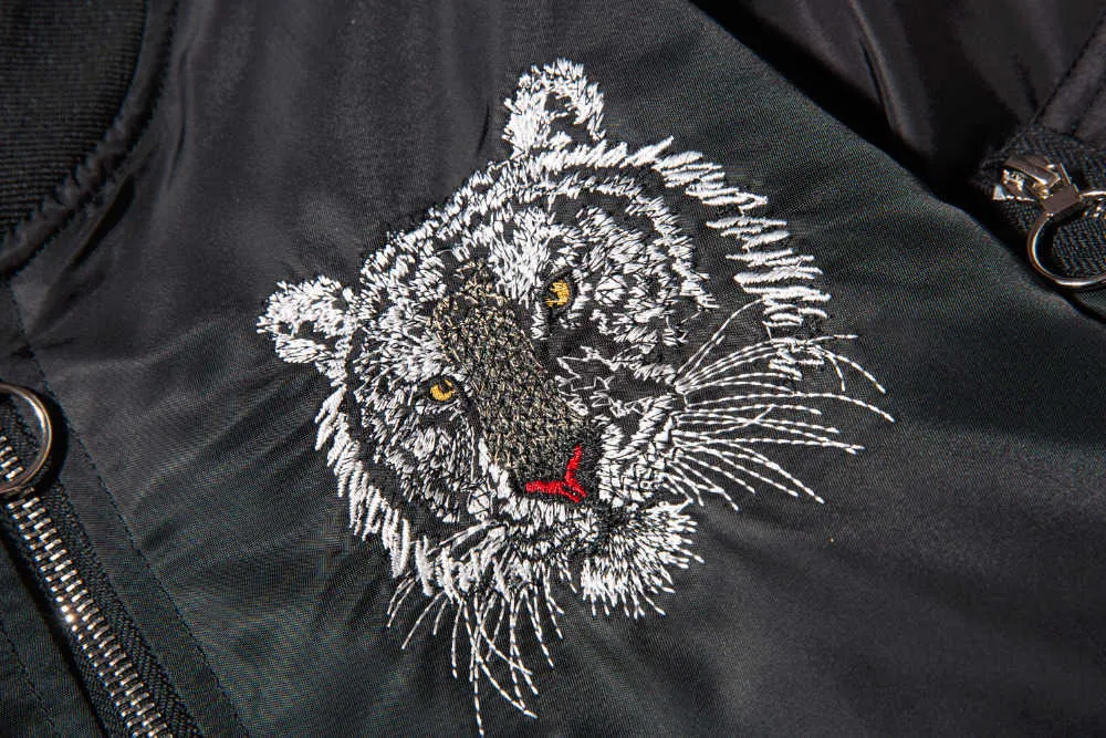 Tiger Winter Jacket Mens Silver and Black Winter Jacket Front Silver Tiger Head Emblem Close Up